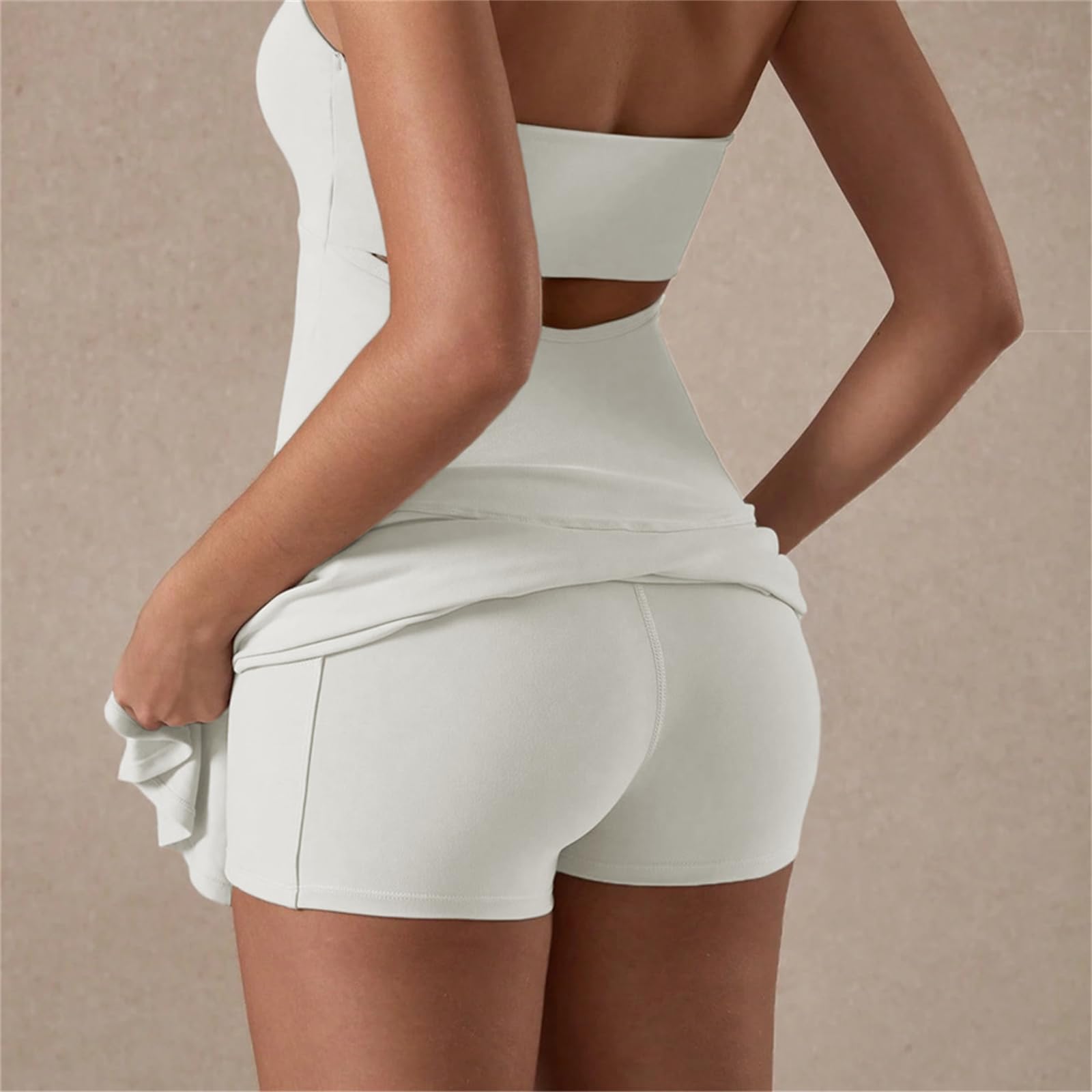 Damska sukienka tenisowa wbudowane szorty sportowe golf aktywny trening sukienka z kieszeniami moda na co dzień falbany dół slim fit mini