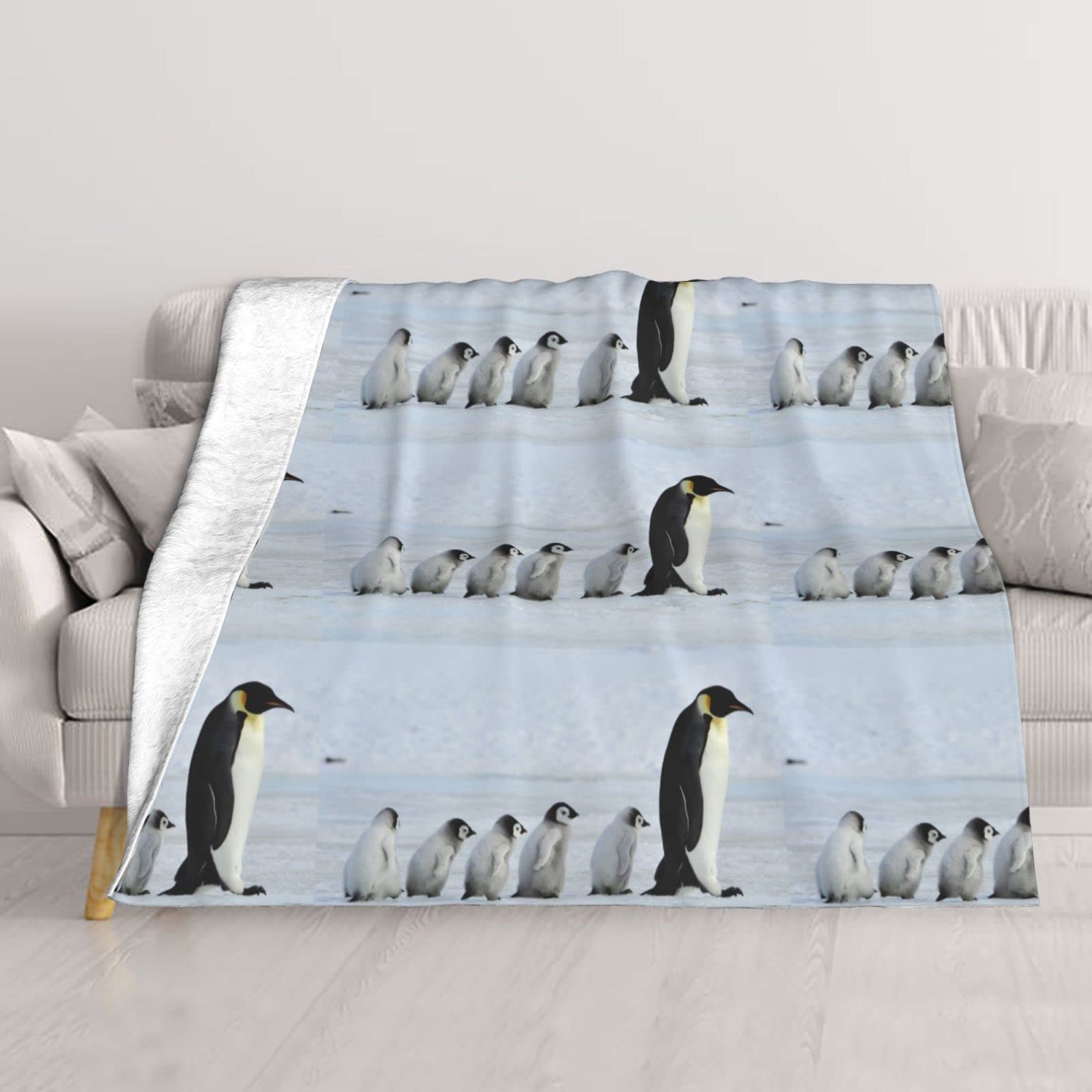 Couverture de canapé pingouin contre le froid de la climatisation