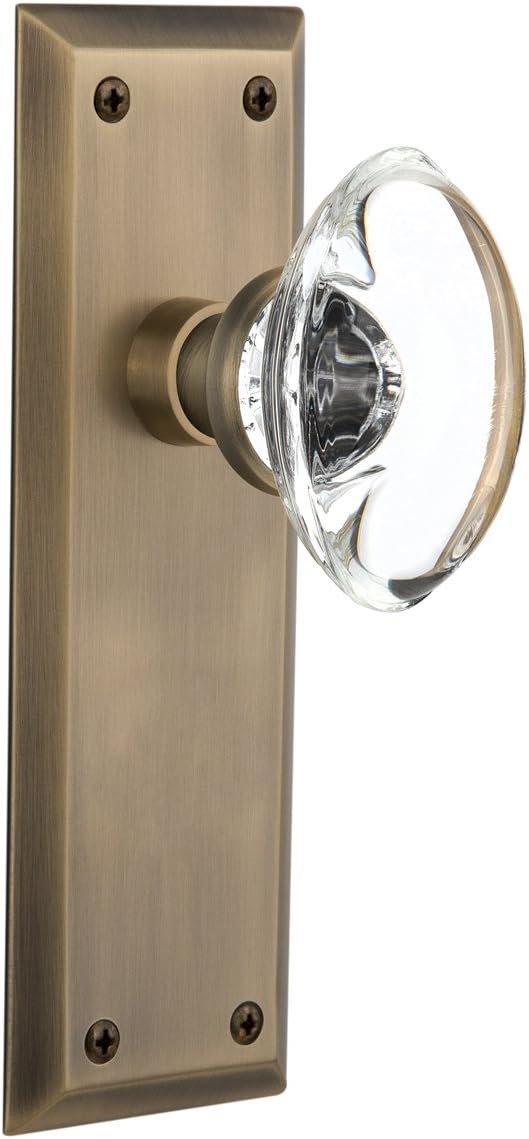 Nostalgic Warehouse New York Plate Double Dummy Oval Clear Crystal Glass Door Knob in Timeless Bronze