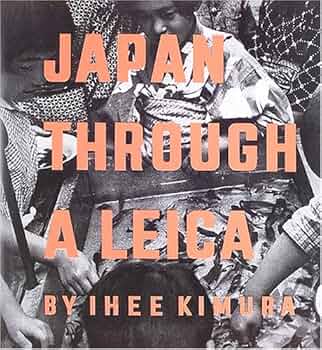 Japan through a Leica: 100 glimpses:sceneries,life and art