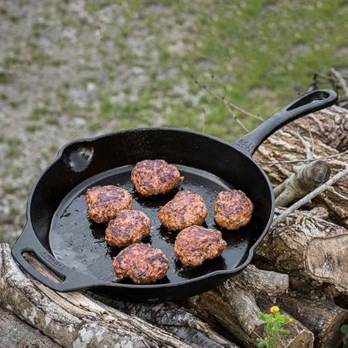 Foto von Petromax Feuerpfanne mit Stiel - Pfanne aus Gusseisen für alle Grill- und Herdarten, Gasflamme, Backofen oder Kochen im Freien - Anbraten, Schmoren und Rösten mit Antihafteffekt - 30 cm Durchmesser