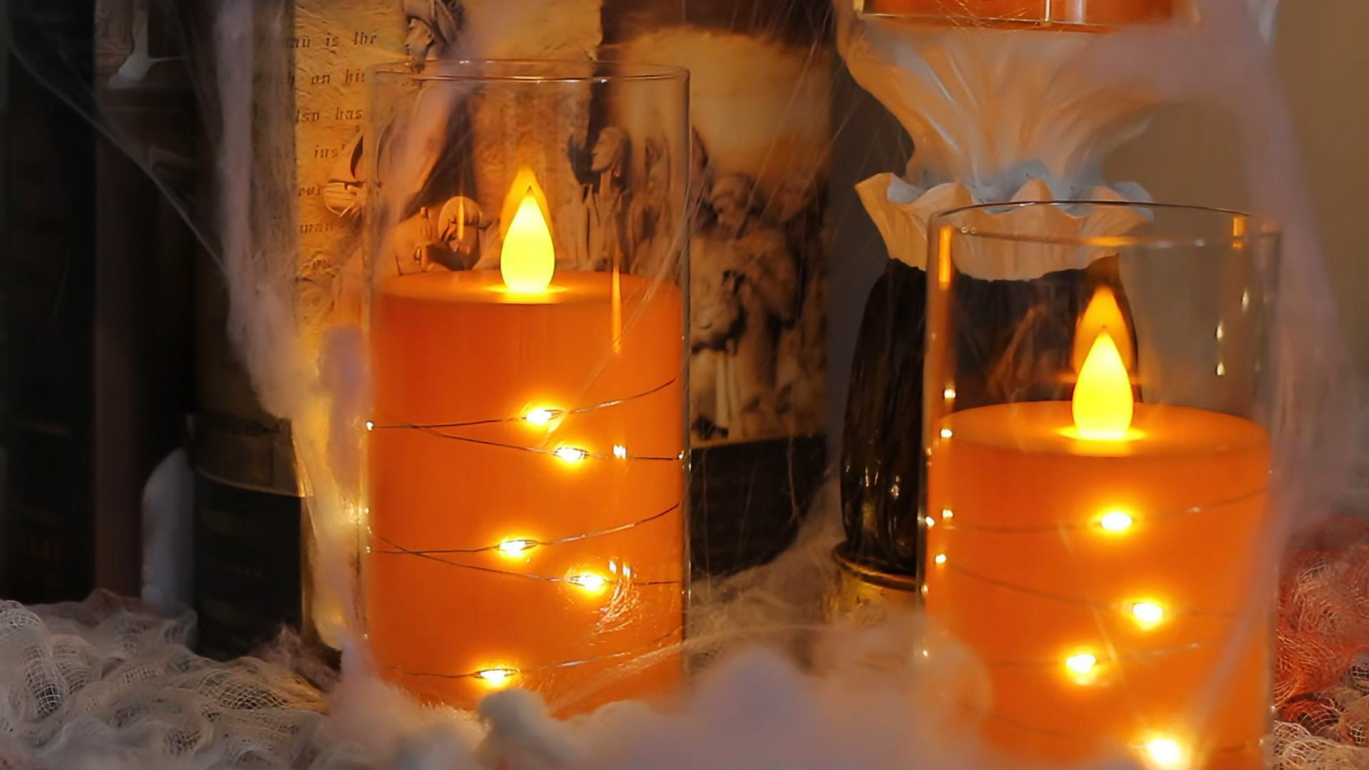 Image of Flameless Flickering 3 inch x4 inch 5 inch 6 inch Clear Plastic Orange 11-Key Remote Candles with Light Strings, LED Battery Operated Cycle Timer Pack of 3 Candles for Halloween Festival Decor