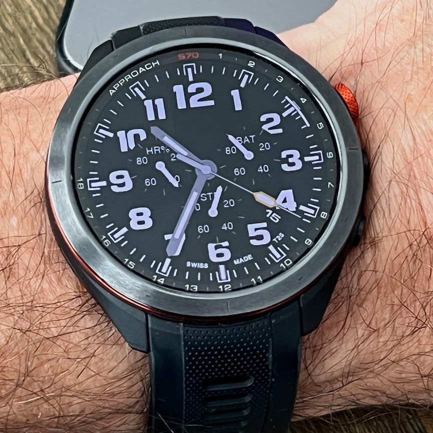 Garmin Approach S70 on wrist showing CourseView map