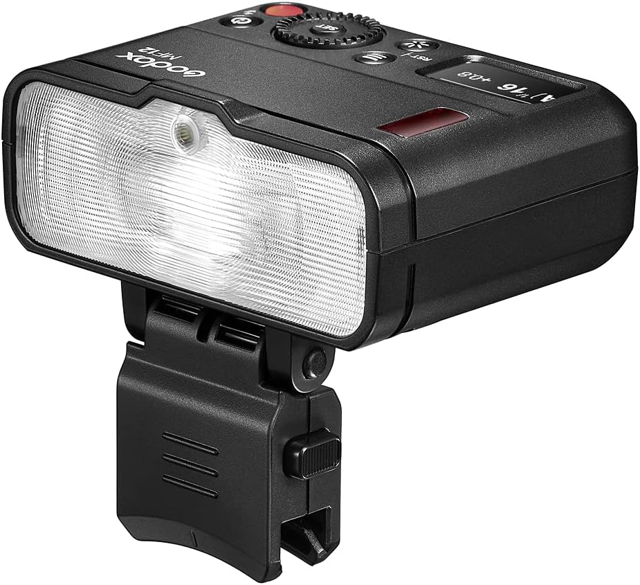 Godox MF12 flash mounted on a camera lens ring