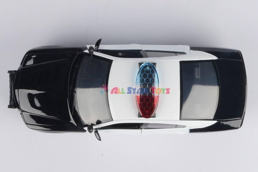 Amazon.com: Motormax 2011 Dodge Charger Police Pursuit LAPD