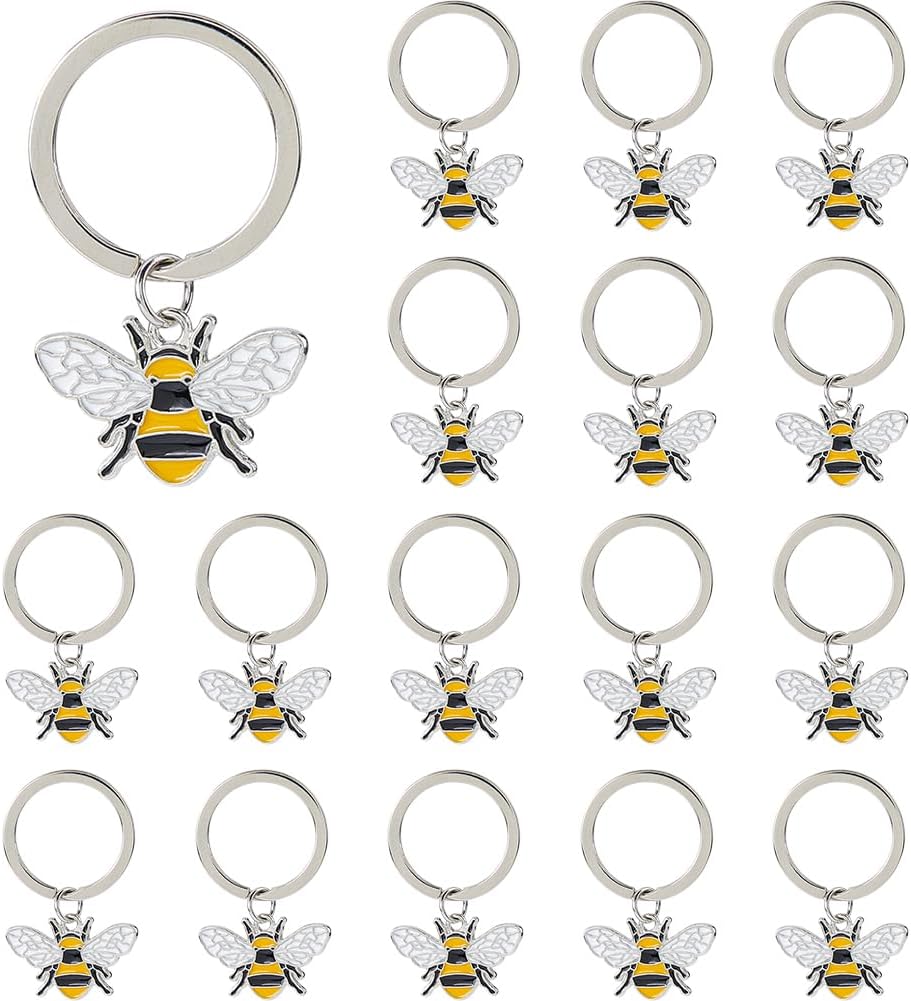 Portachiavi smaltato a forma di mimosa — metallo dorato, anello portachiavi incluso