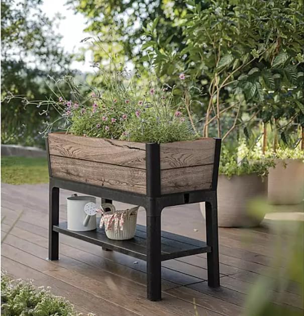 Keter Elevated Resin Garden Bed assembled on a deck with plants