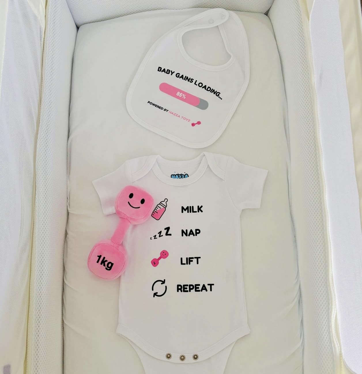 Hazza Toyz Lil Lifter Starter Set - Baby Gift Box with Plush Dumbbell Toy, Cotton Bodysuit & Bib, Candy Château Pink, 3-6 Months - Image 3