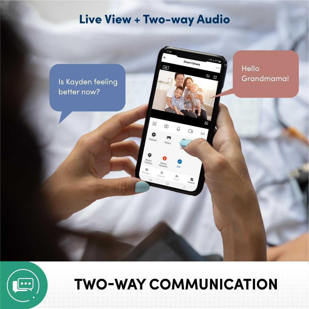 Image of hands holding a smartphone displaying a live camera feed with chat bubbles indicating two-way communication.