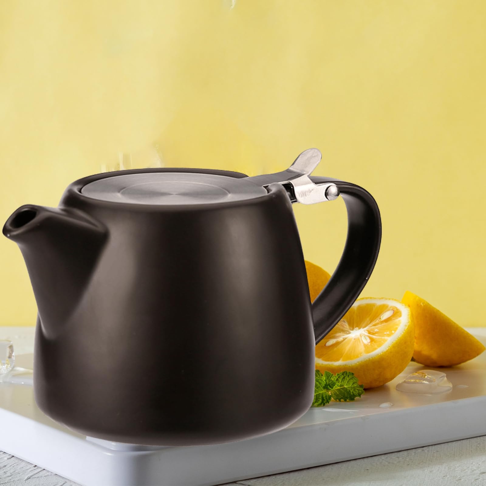 Tetera con colador, 500 ml, tetera de cerámica negra, olla de té de porcelana, accesorios para té suelto, aislada y sin goteo, calor duradero
