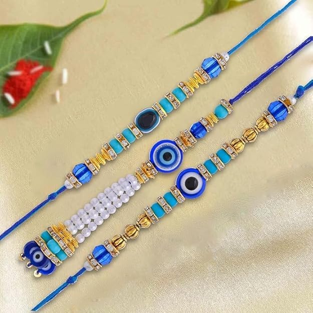 Image of Saudeep India Fridge Magnet with Rakhi Combo Gift Set of Evil Eye Lumba Couple Rakhi for Bhaiya Bhabhi & Brother | Travel Souvenir | Refrigerator Magnet