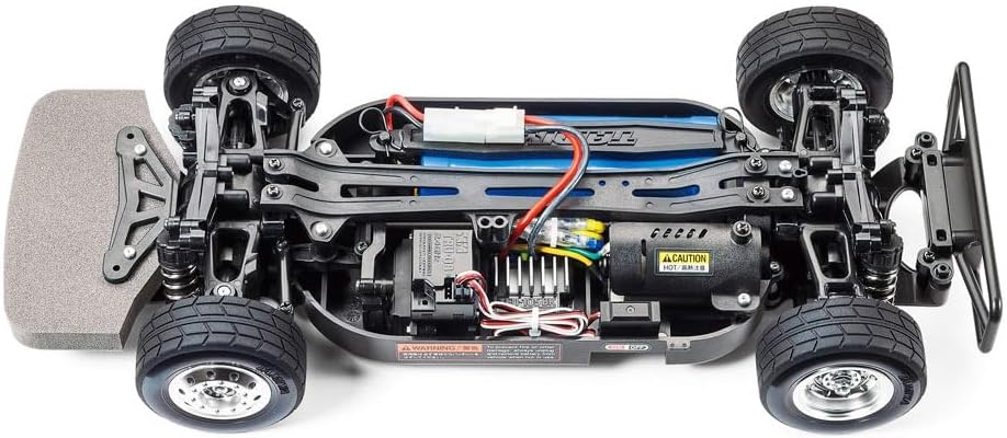 Part inferior view of TAMIYA TT-01E chassis with electronics
