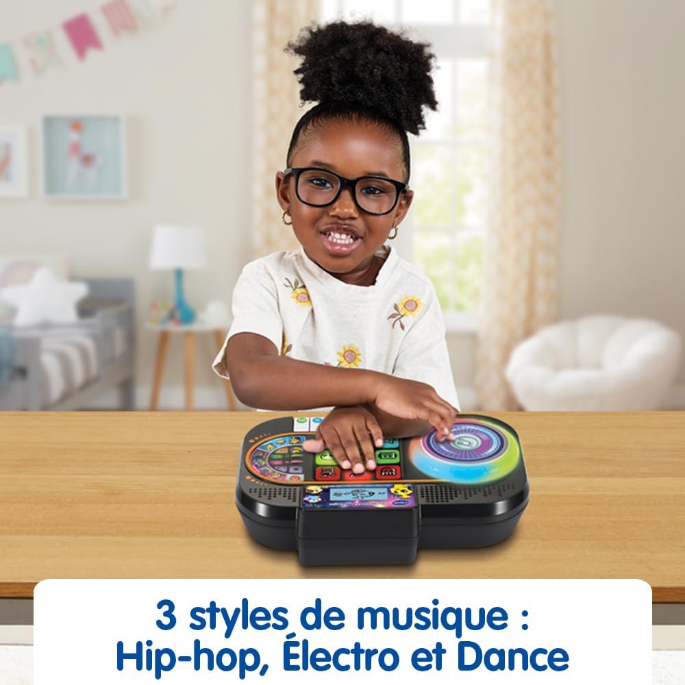 Child's hands interacting with the control pads and scratch disk of the DJ Studio Magic Light.