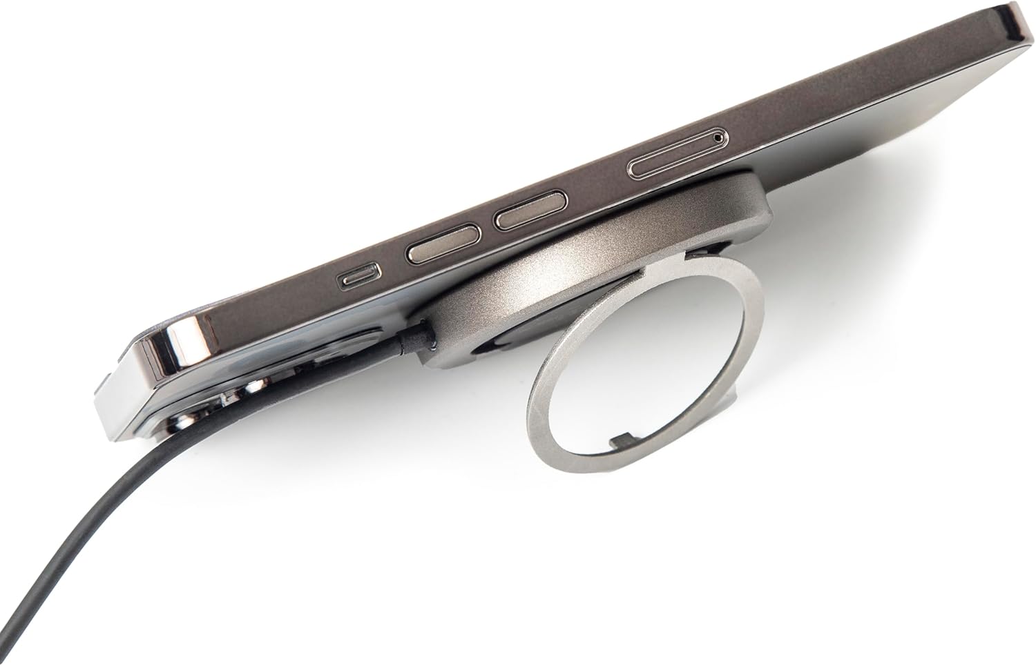 TYLT MagSafe Wireless Charger Ring Stand attached to an iPhone, viewed from the side, showing the slim profile.