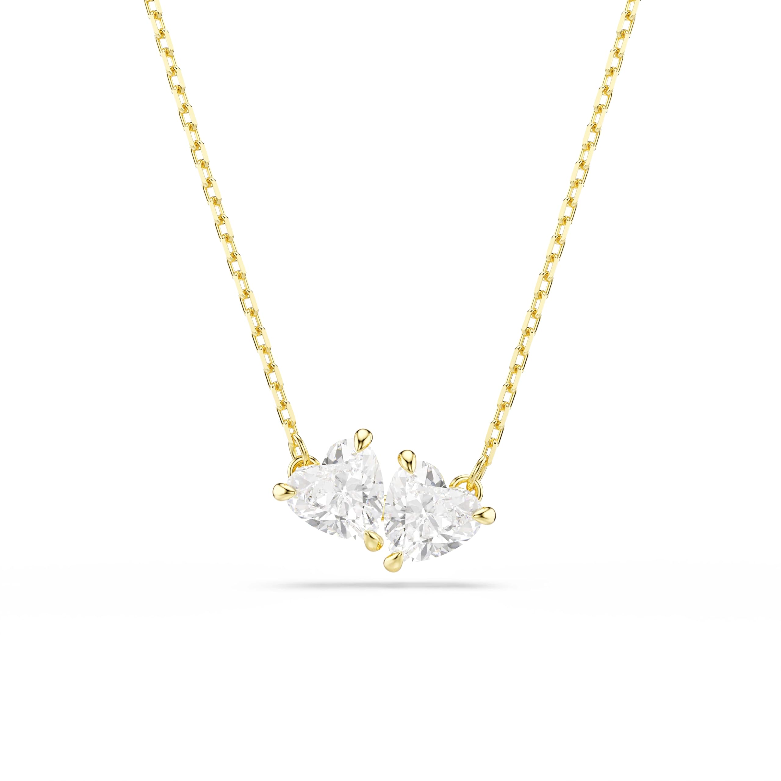 Swarovski Collier, de la collection Mesmera, cristaux incolores de taille cœur, sertissage griffes, accroché à une chaîne en placage de ton or