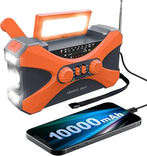 Orange emergency radio with flashlight, reading light, hand crank, antenna, and phone charging cable
