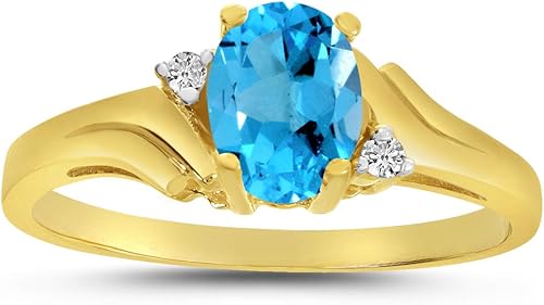 Anillo de oro amarillo de 14 quilates con topacio azul ovalado y diamantes