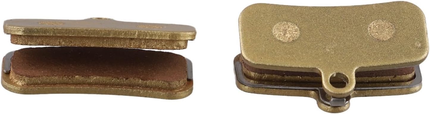 Side profile of a single brake pad, showing the layered construction of the semi-metallic material and backing plate