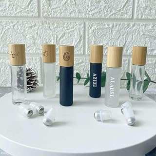 Zyvola 100 Pack 10ml Refillable Glass Roll-On Bottles with Bamboo Lids ‚Äì Ideal for Essential Oils, Perfume, Lip Gloss, T...