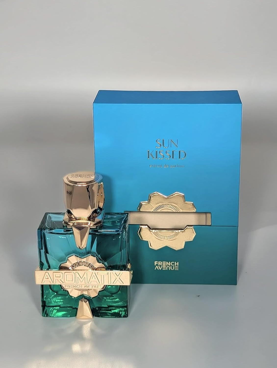French Avenue Aromatix Sun Kissed Eau De Parfum, Woody Aromatic Unisex Fragrance, 3.4 fl oz, with Pomelo, Tea and Cedarwood Notes, Turquoise Glass Bottle with Gold Accents