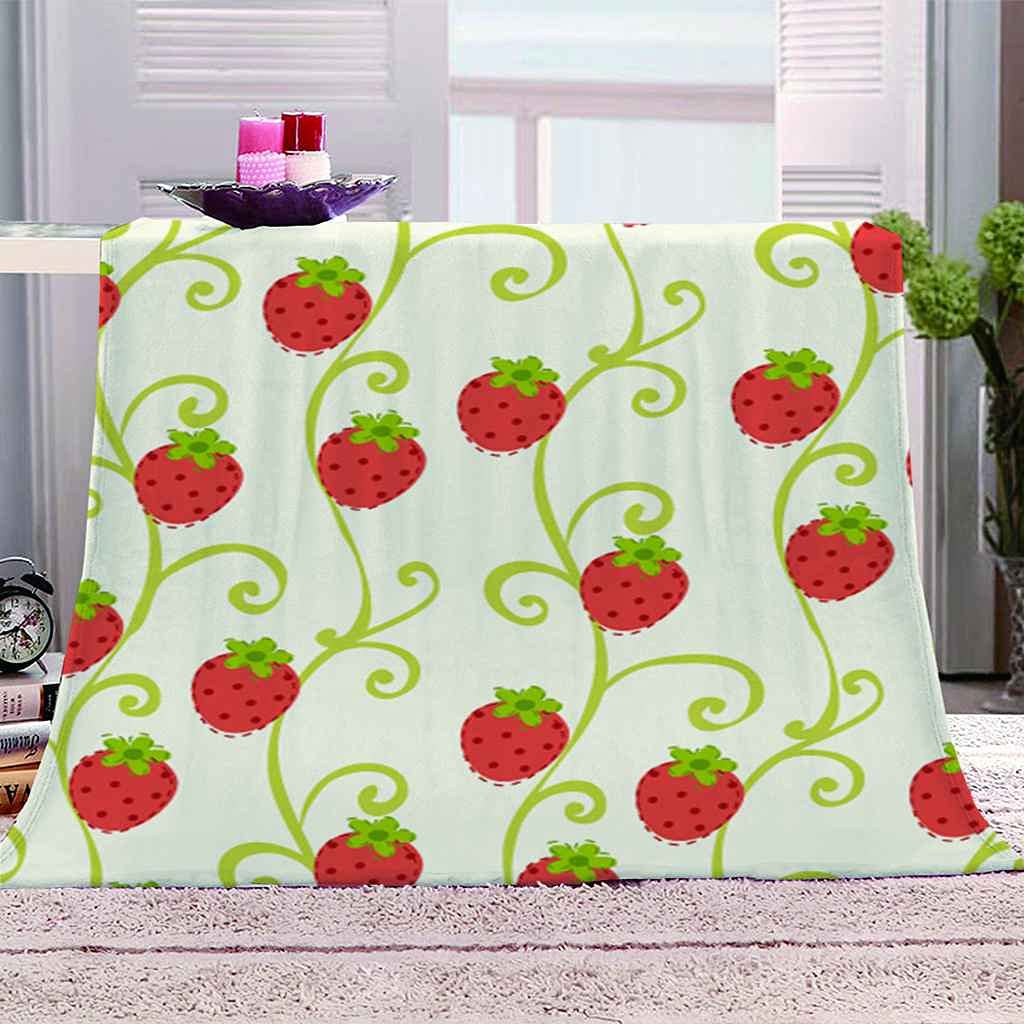 Couverture canapé fraise pour vos soirées cocooning et moments de détente au salon