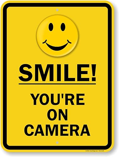 SmartSign Letrero de metal con la frase "Smile You're On Camera" de 24 x 18 pulgadas con agujeros pre-limpiados, aluminio laminado inoxidable de 80