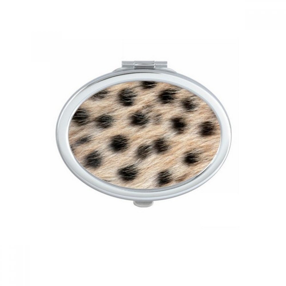 Miroir de poche compact contre les retouches maquillage ratées