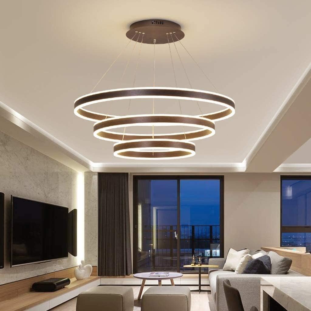 ISAPEE モダンな幾何学的なリビングルームゴールドリビングルーム寝室の背景壁画壁画背景壁 クリーム色の壁のあるリビング ルームに革のソファとインテリアの背景にモックアップ フレーム | Premium写真