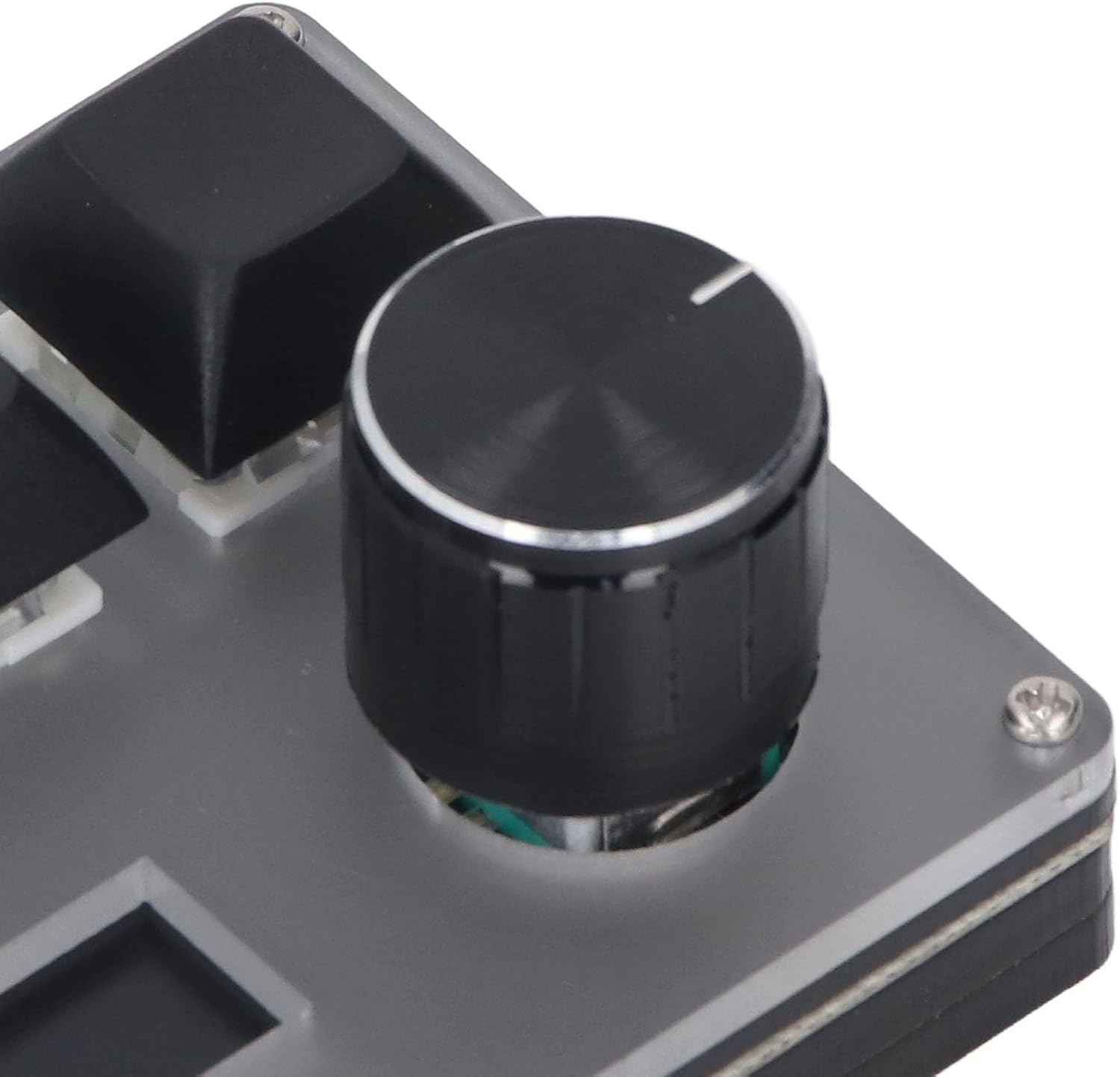 Close-up view of the rotary encoder on the Fockety 3-Key Wired Custom Keyboard, showing its textured surface and metallic finish.