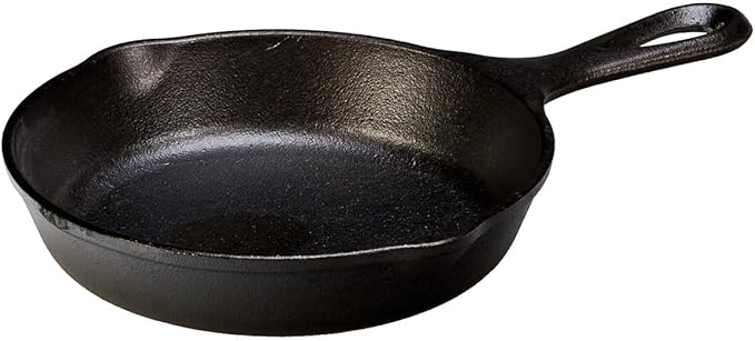 The Lodge L3SK3 6-1/2-Inch Logic Pre-Seasoned Skillet is a versatile and compact piece of cookware, ideal for small families, couples, or individuals. Made by Lodge, a well-known American manufacturer of cast iron cookware, this skillet offers superior heat retention and even heating, making it perfect for a variety of cooking tasks like frying, sautéing, and baking. The 6-1/2-inch size is particularly suitable for single servings or side dishes.