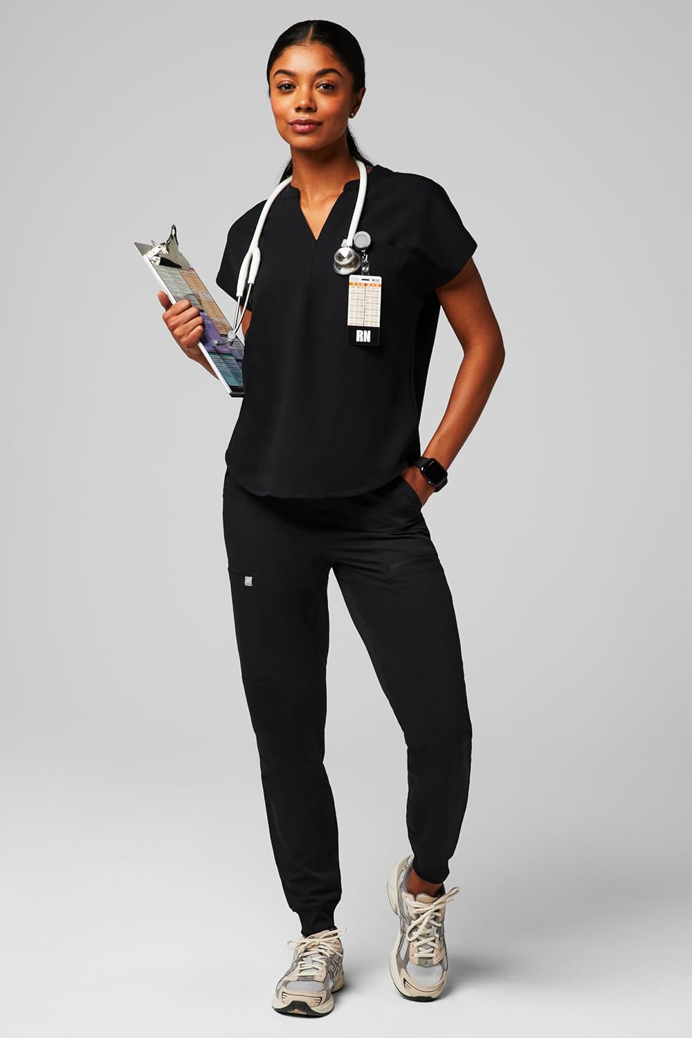 Fabletics Women's Evolve 3-Pocket Scrub Top with an Oversized Fit - MotionTech, 4-Way Stretch, Wrinkle-Resist, Anti-Shrink - Image 7