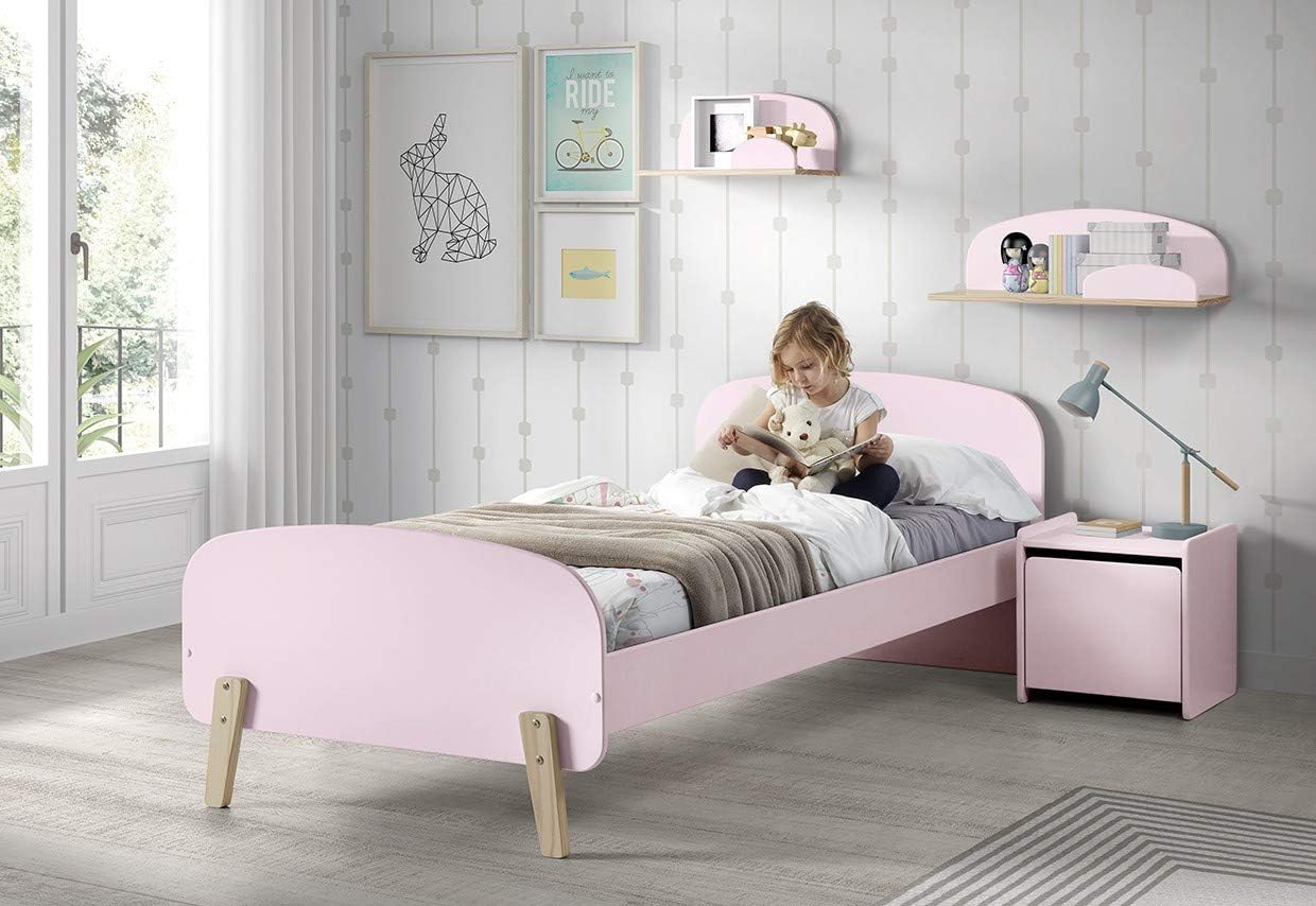 Child reading on the VIPACK Kiddy Bed in a bedroom setting