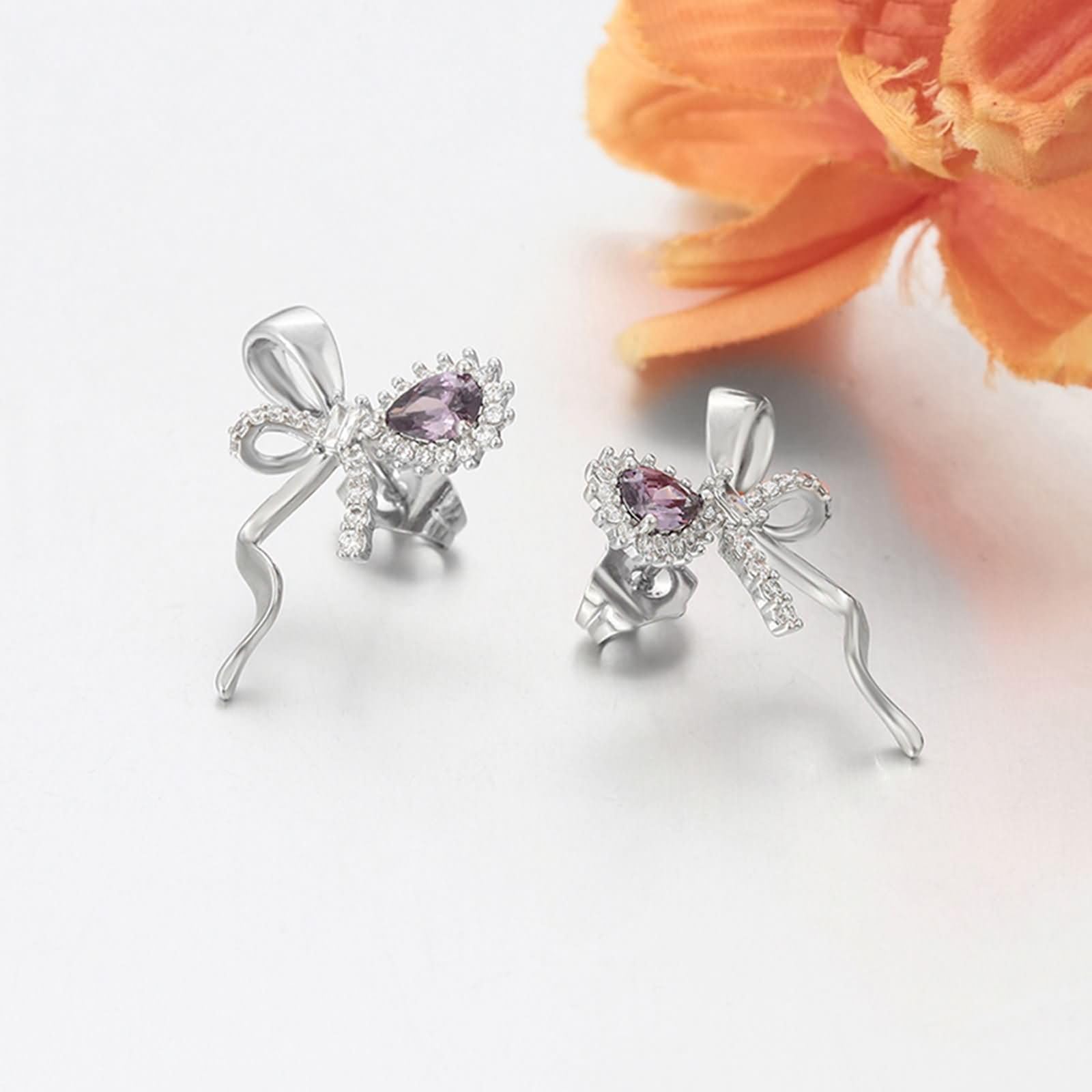 Pendientes con nudo de mariposa, amatista y moissanita