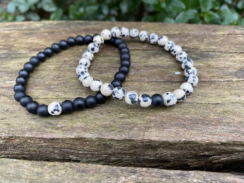 Bracelet extensible couple perles agate noire jaspe dalmatien relation distance