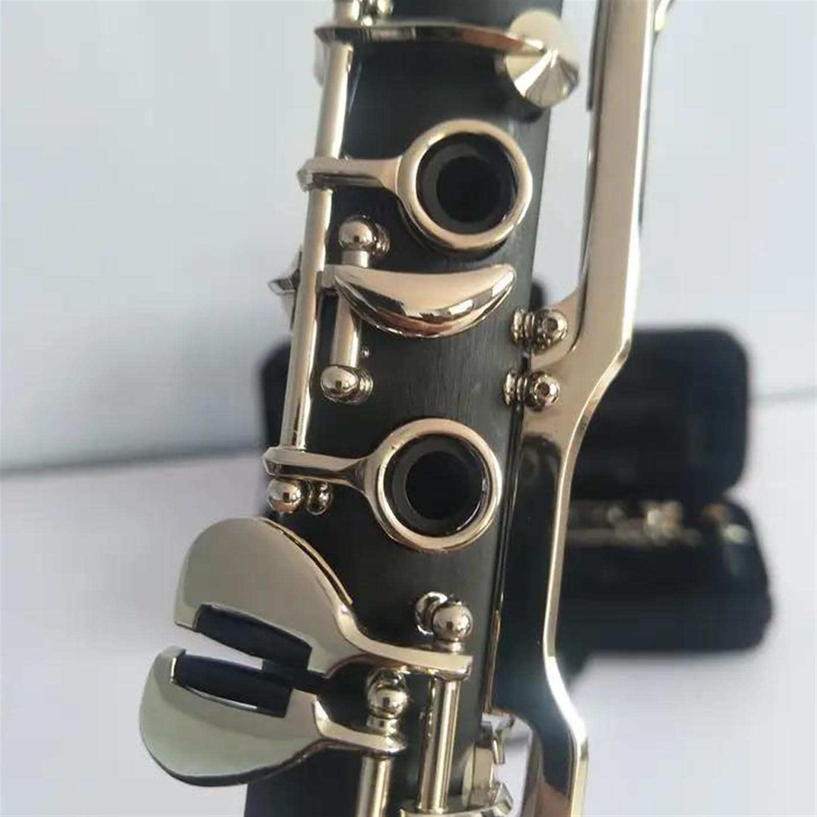 Instrumento de clarinete de 18 teclas en tecla G Cuerpo de baquelita Superficie niquelada Clarinete Profesional