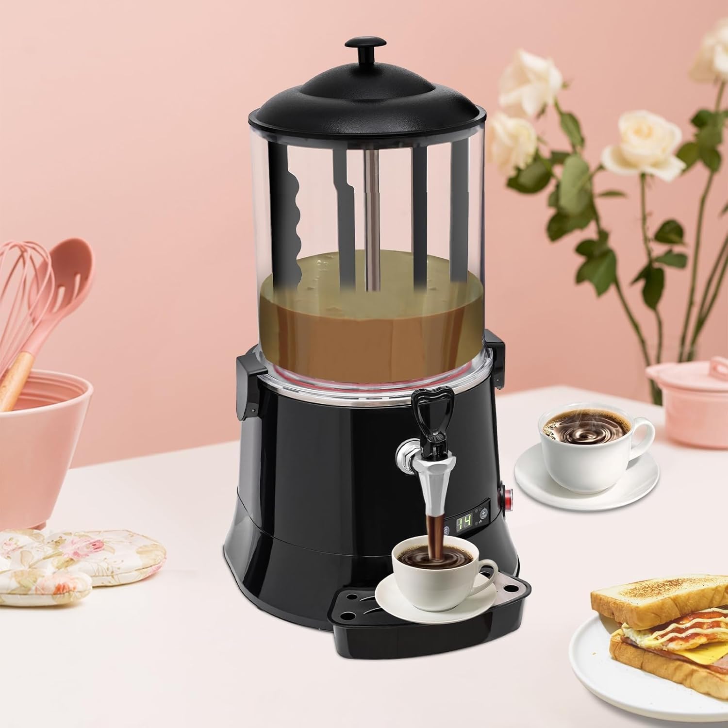 Hot chocolate being dispensed from the machine into a cup