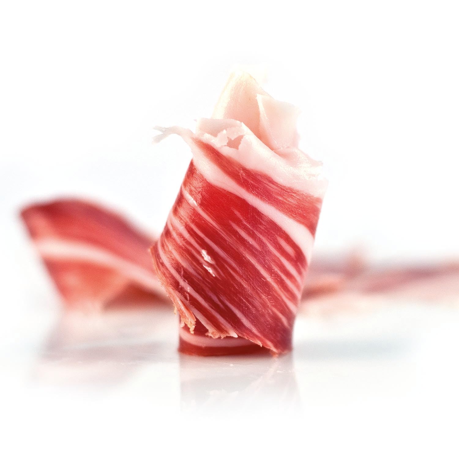 ENRIQUE GARCÍA - Jamón de Cebo Ibérico 75% Raza Ibérica, 10 Sobres Envasados al Vacío de 100 g Aprox. Acabado plástico. Caja regalo de cartón. Corte a máquina.