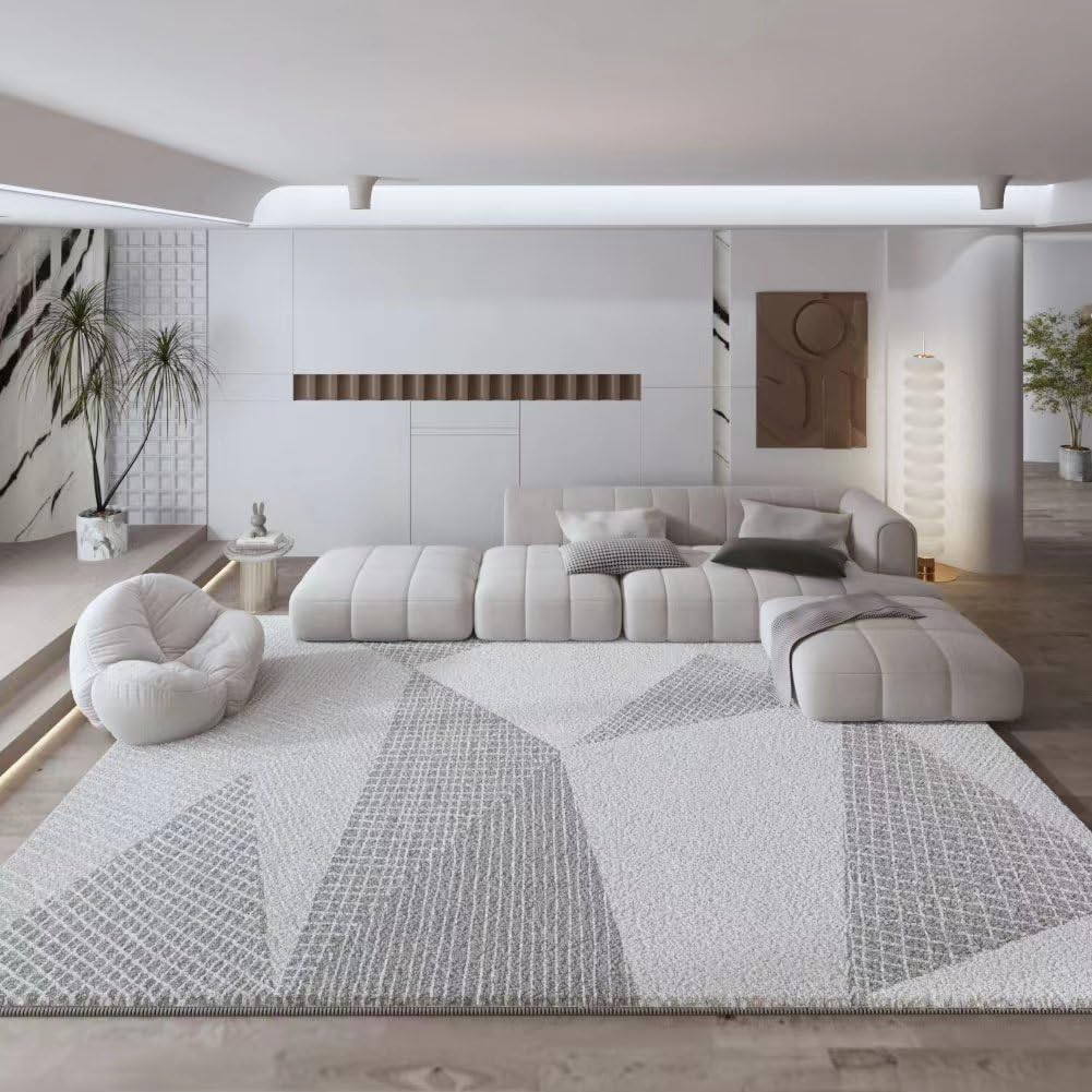 Tapis géométrique moderne gris idéal pour réchauffer l'ambiance de votre salon