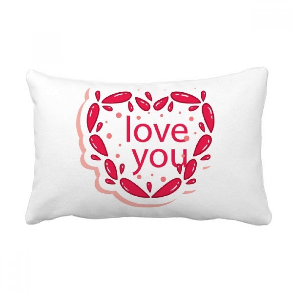 Coussin coeur rose de la St Valentin pour décorer votre canapé de salon chaleureux