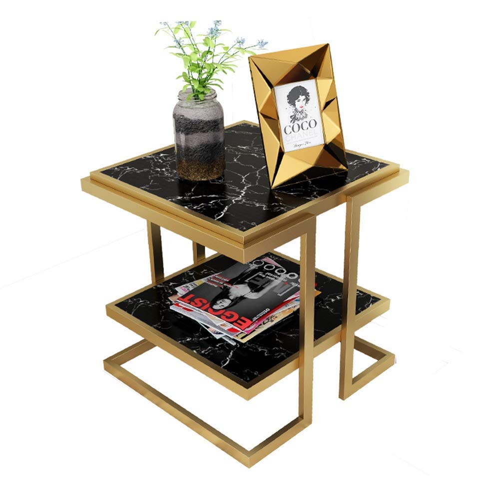 Table basse multifonction noire pour optimiser les petits salons encombrés