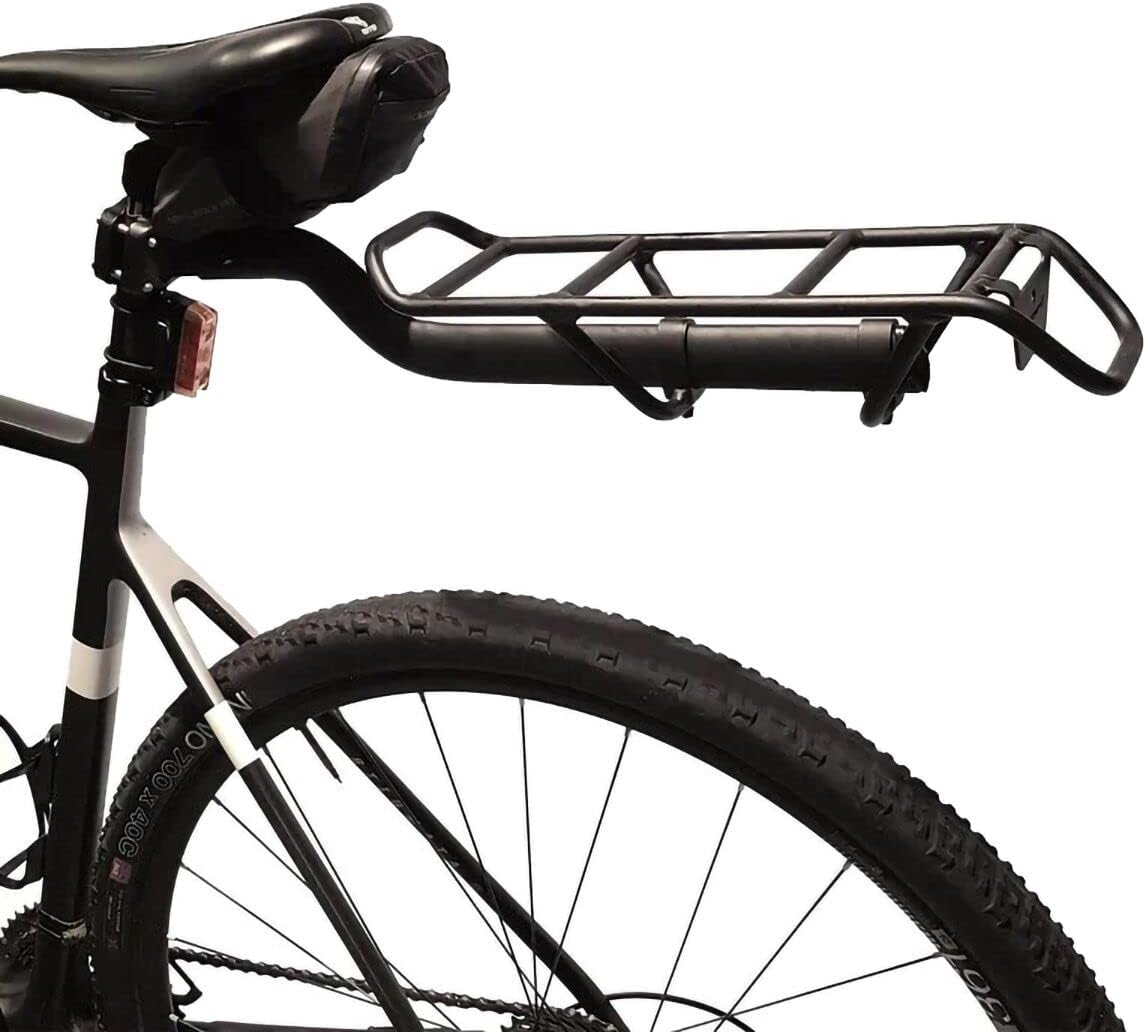 Blackburn Central Seatpost Rack installed on a bicycle, showing the attachment point to the seatpost and the rack extending horizontally over the rear wheel.