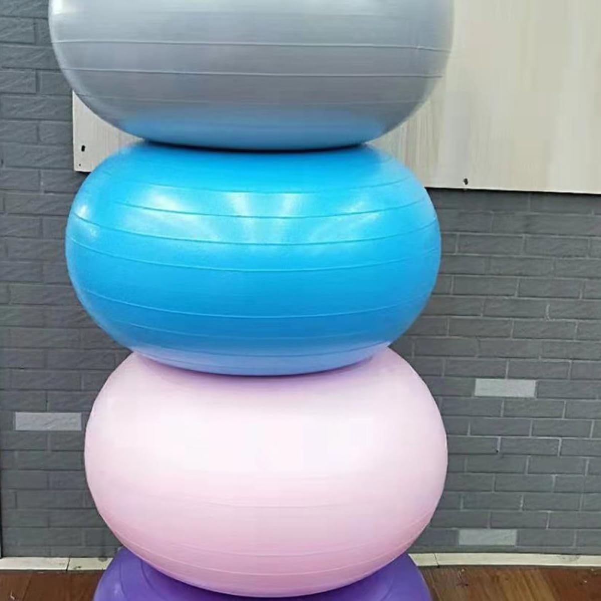 Pelota de Yoga con Superficie Antideslizante y Bomba de Aire de PVC con Forma de Donut Antiexplosion para Ejercicios de Equilibrio y Tonificacion