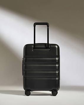 ANTLER - Icon Stripe Hardside Carry On Luggage with Pocket, 21.7x15.7x9.4 Inch, 47L - Lightweight, 4 Spinner Wheels, Adjustable Handle, External Front Pocket, Small Suitcase, TSA Lock - Black