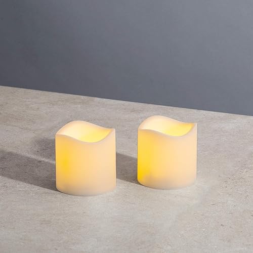 LampLust Velas sin llama para exteriores, impermeables, paquete de 2, juego de velas de pilar marfil de 3 x 3, velas LED parpadeantes con control