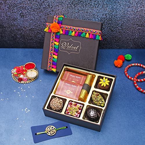 Image of Velvet Fine Chocolates Rakhi Gift Hampers Pack for Brother & Sister | Rakhi Gift Box with 5 Assorted Chocolates, 1 Cranberry Log, 1 Hazelnut Chocolate Bar, 1 Orange Chocolate Bar & Rakhi