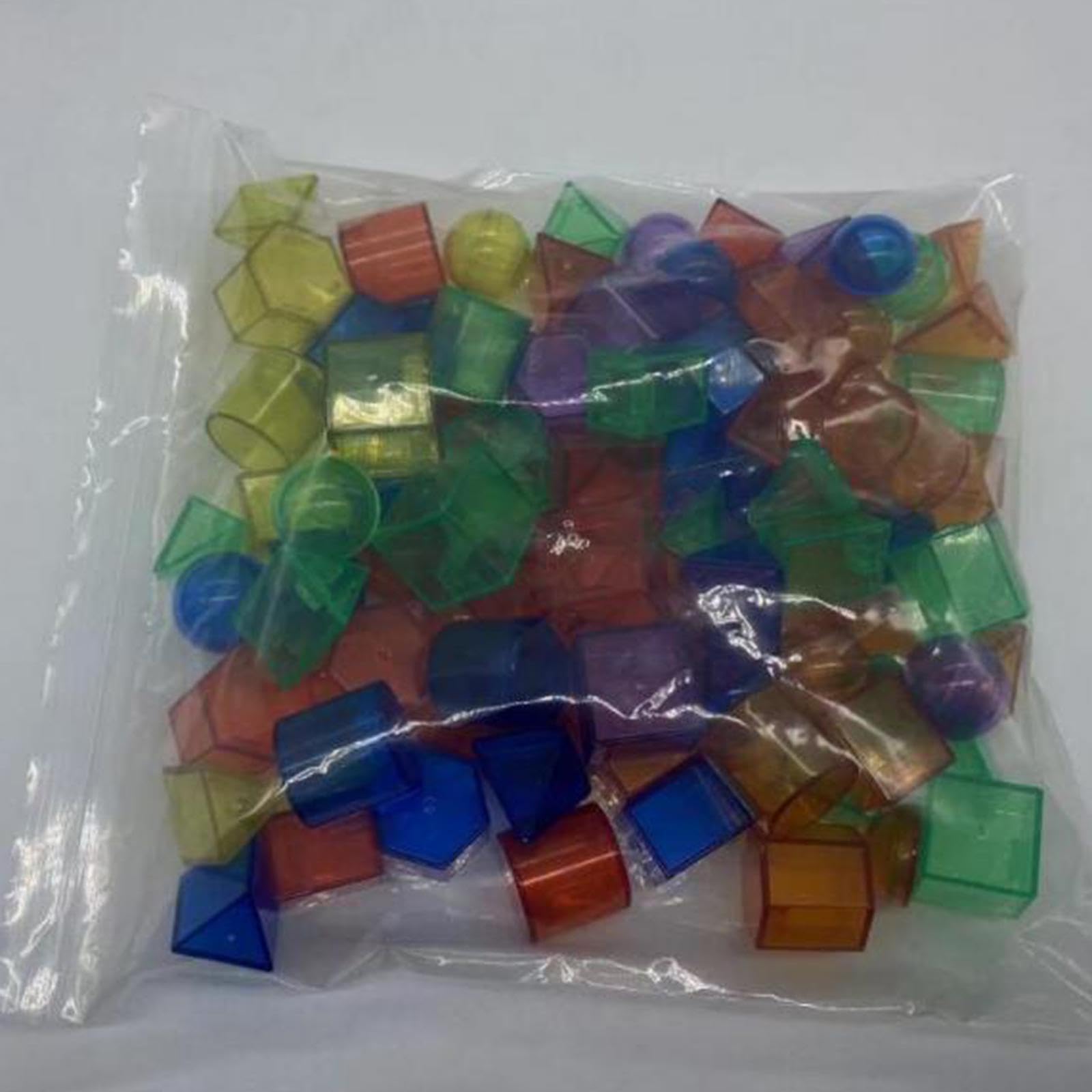 Qianly 100 Bloques Geométricos Translúcidos con Patrones para Niños. Material Didáctico Colorido para Profesores.
