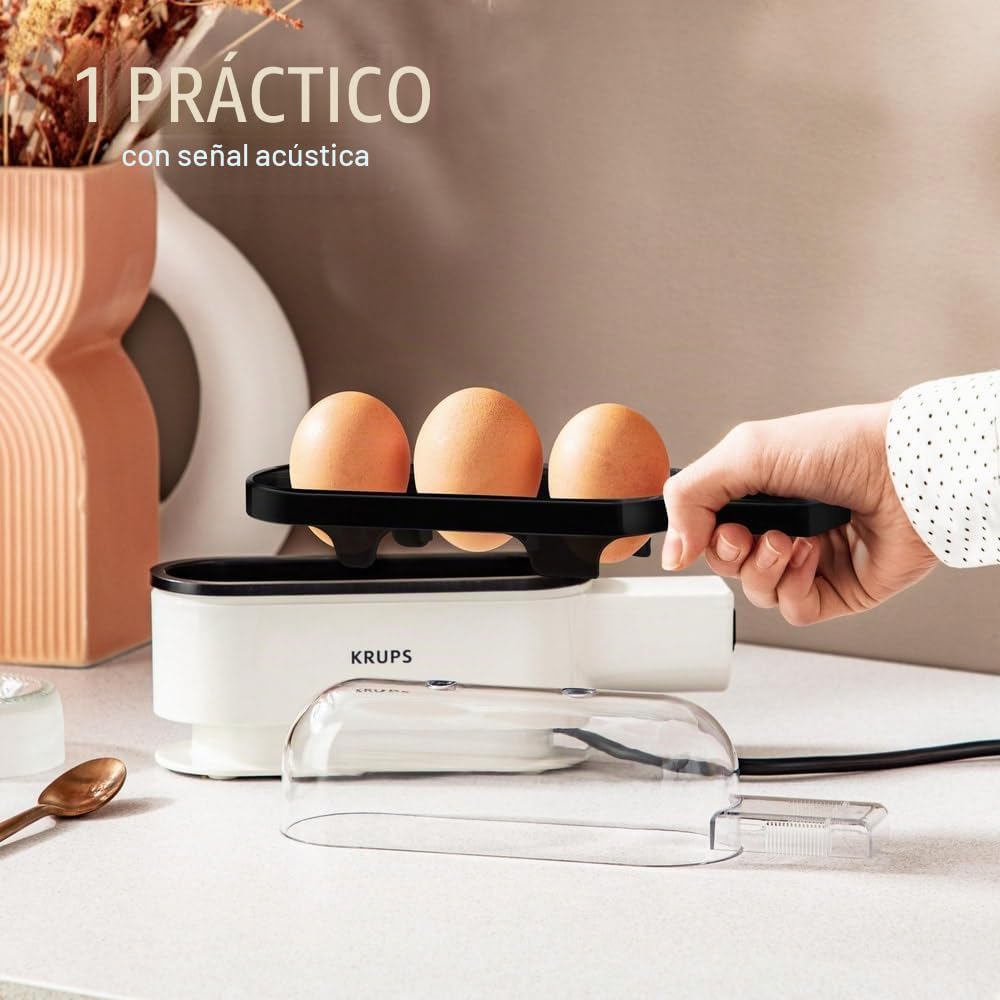 Krups Ovomat EG234115 Trio - Huevera para hasta 3 huevos, incluye vaso medidor de agua con cortador de huevos, soporte para huevos, pitido, sin BPA