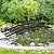 OLBRUS Metal Garden Bridge 8 FT with 4 Ground Stakes, 770 lbs Capacity Black Powder Coated Footbridge for Backyard, Lawn, Creek, Stream & Garden Decor