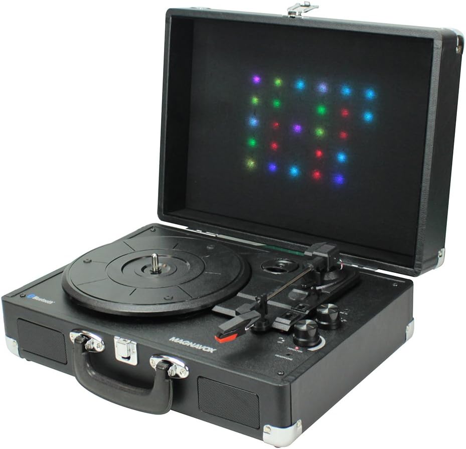 Angled view of the Magnavox MD699 Turntable System open, showing the record player and the illuminated lid.