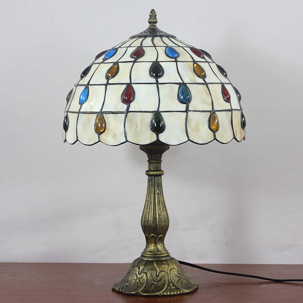 Mozaikowy szklany stolik, lampka nocna, lampa z brązową podstawą